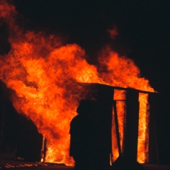 Burning shack remains
