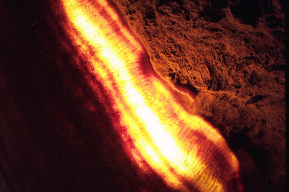 Beauty Cave, California photograph. This is a closeup of bacon lit from behind.