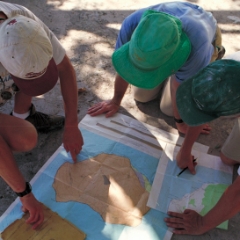 Cavers studying the map
