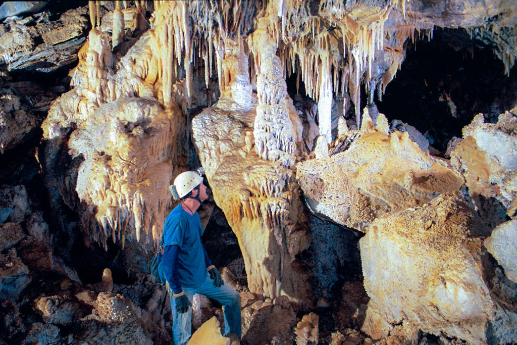 Palmers Cave, California photograph. A column forms when stalactites and stalagmites grow towards each other and meet.