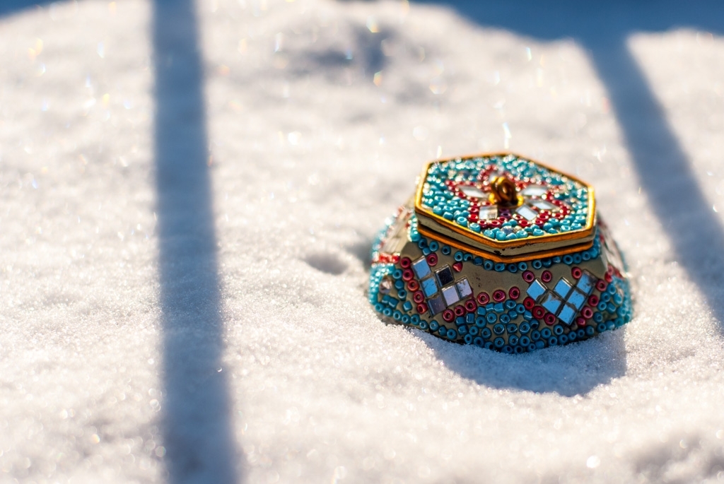 Colorful things photograph. Series one of many: small things in snow. Wee decorative box!