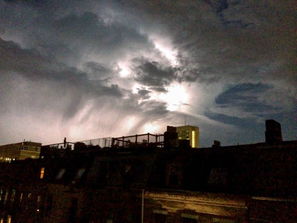 Boston, Massachusetts photograph. I saw a few bolts, but mostly vague flashes of light behind clouds like this. This is the view from my deck looking west.