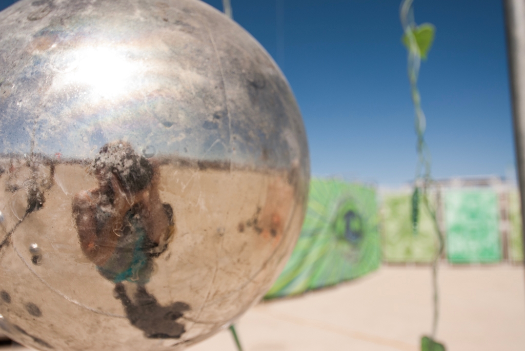 Burning Man 2007 photograph. A closeup of a piece of art, with my reflection.