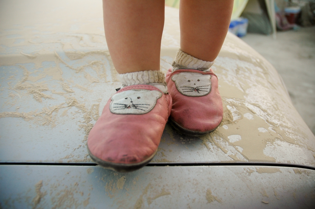 Feet and Shoes photograph. Baby stands up in the cute kitty shoes.