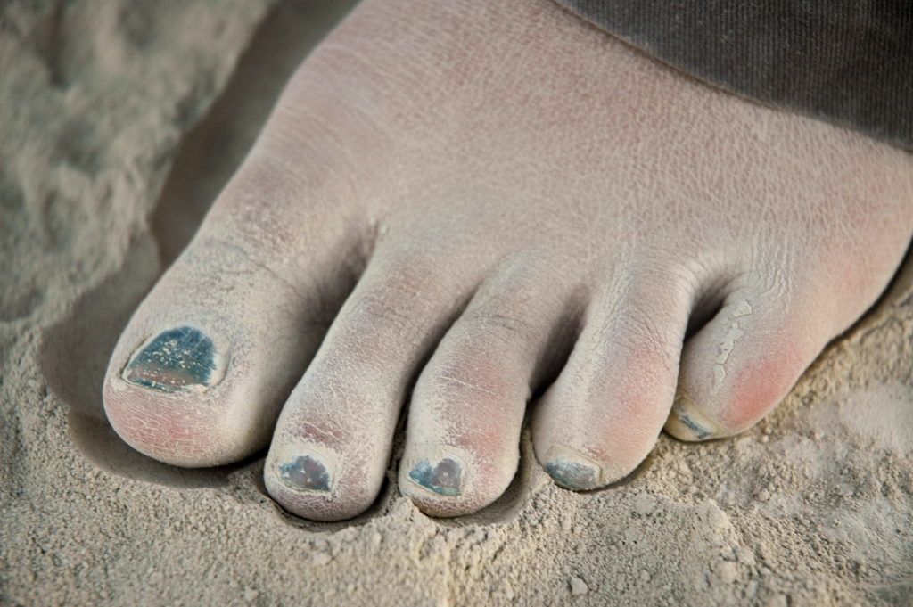 Feet and Shoes photograph. Closeup of dusty toes.