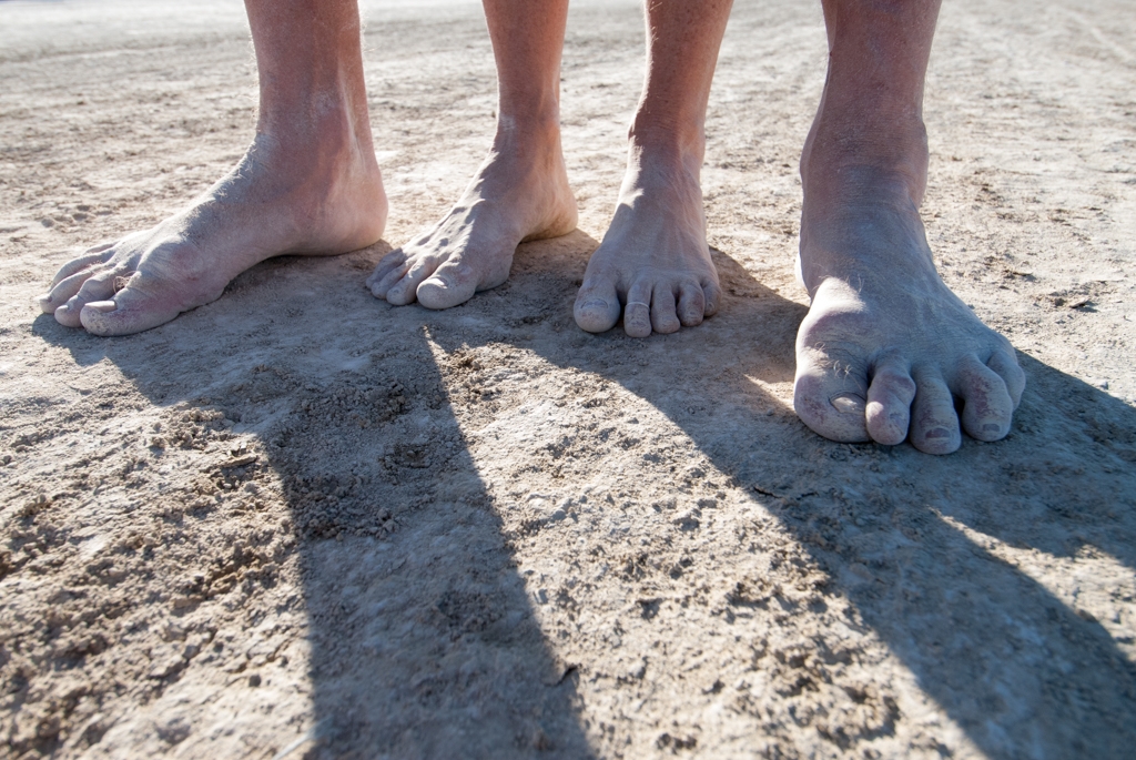 Feet and Shoes photograph. This man and woman chose to stand this way for the camera. This was a delightful older couple who seemed to express their feelings for one another in the way they arranged their feet. I liked this couple.
