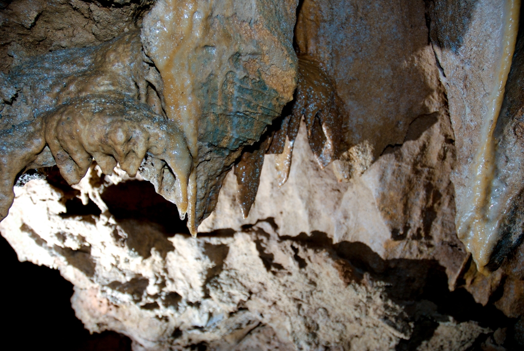 Lilburn Cave and Snow in King's Canyon photograph. Stalactites iinside Lilburn Cave. Note the teal and orange coloring from mineralization.