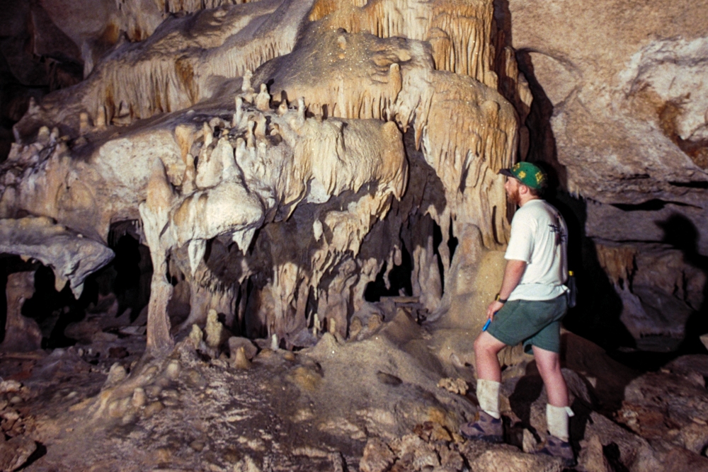 Mona Island Caves, Puerto Rico photograph. Caver in photograph adds perspective