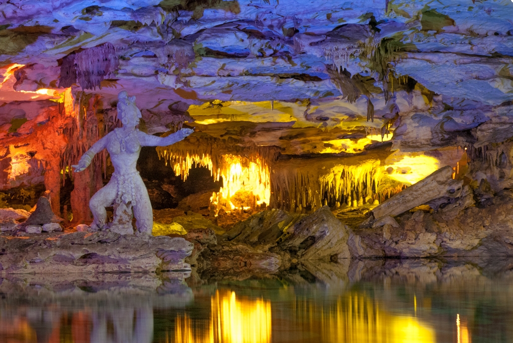 Mexico Caves & Cenotes photograph. Cenote Kantun Chi north of Akumel, Mexico on the Yucatan peninsula. There was a beautiful Mayan music presentation, and then we swent snorkelling through the cave &mdash. A cenote is a fresh water cavern. Most were originally used by Mayans for drinking water.