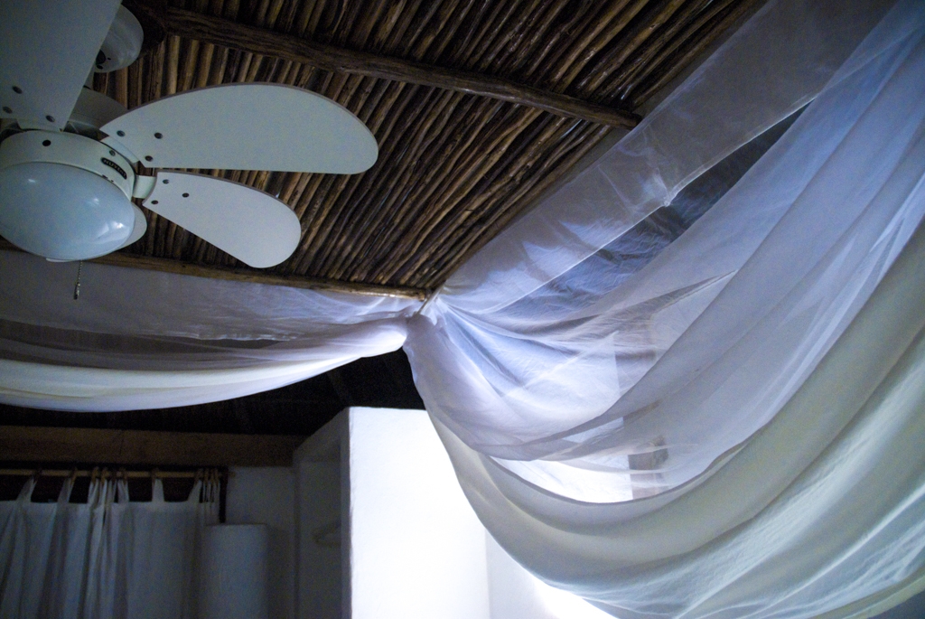 Mexico Caves & Cenotes photograph. You can rent cabanas on the beach in Tulum, 2 hours south of Cancun, and walk to the restaurants and eat by the beach and stars. This was our cabana, barely enough room for a gigantic king size (bigger than a normal king size) bed. It's a private little place and you can walk directly onto the beach. I highly recommend renting a cabana on the beach!