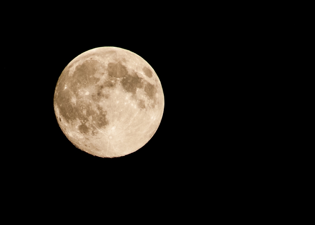 Sky, lightning and clouds photograph. I like all the crags and details shown on the surface of the moon. I used my longest lens for this shot. 