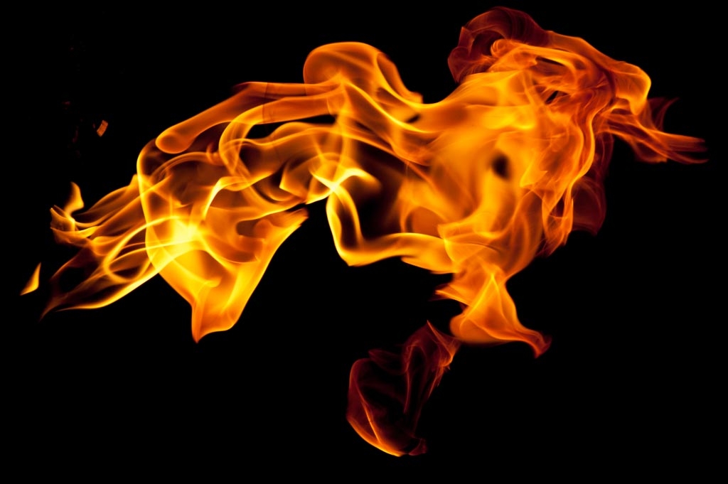 Fire and flames on a black background photograph. 