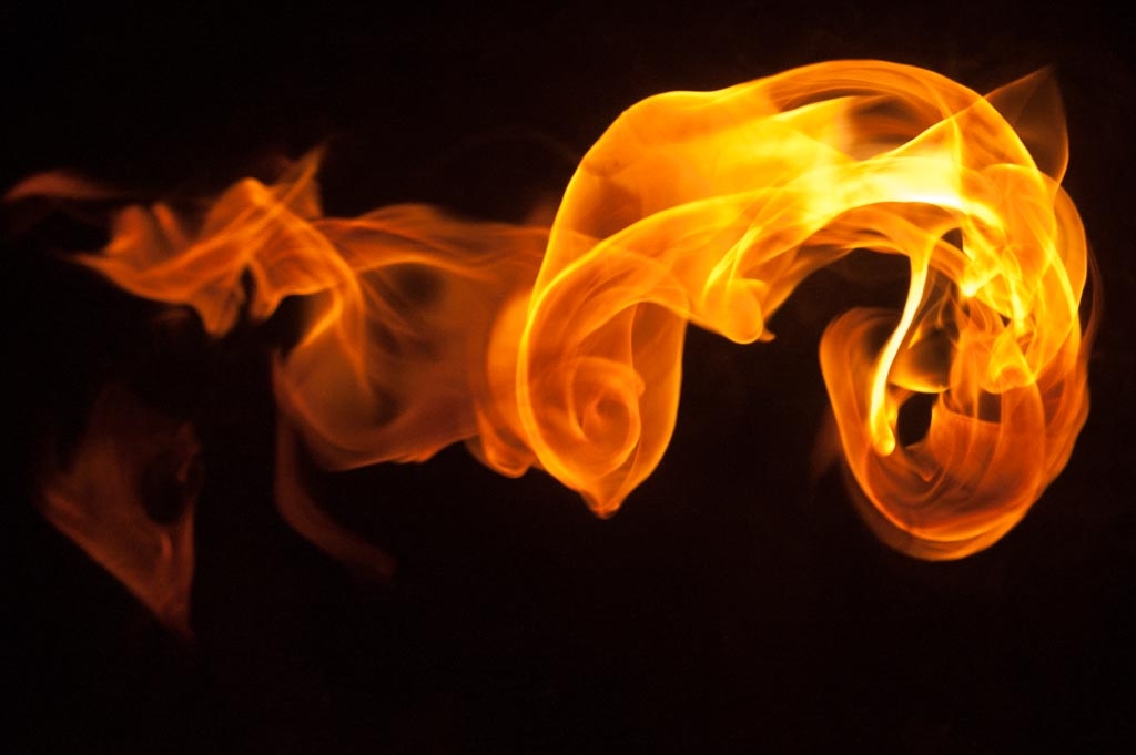 Fire and flames on a black background photograph. 