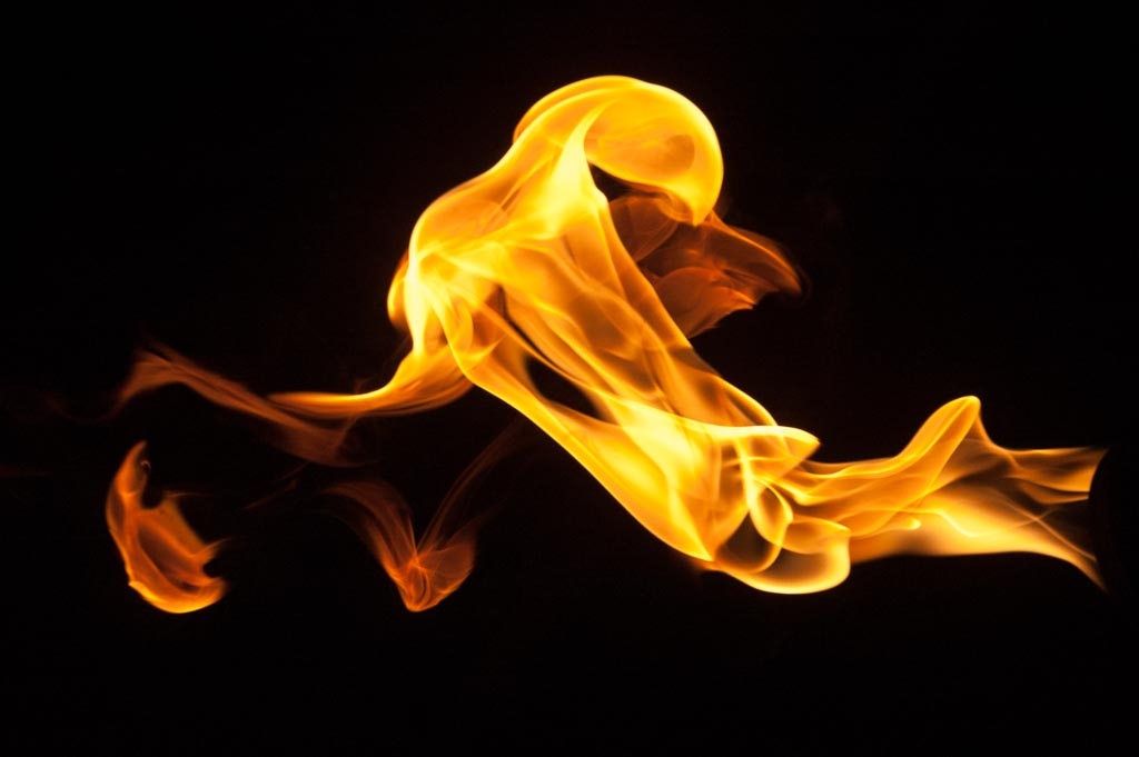 Fire and flames on a black background photograph. 