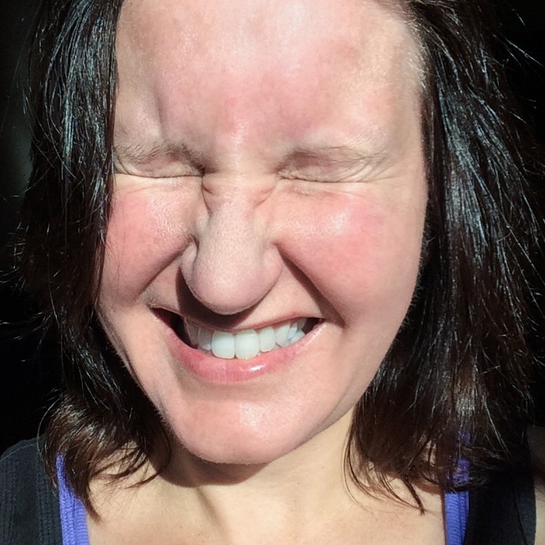 Pictures of Kristen photograph. Goofing around in the sun. I kept my hair dark brown back then.