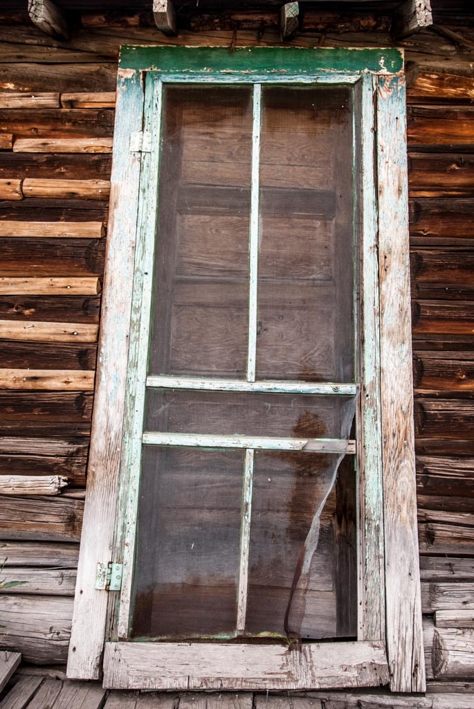 Road trip across America photograph. I like this rickety colorful door. I think I was in Minnesota. Epic road trip of 2013 from San Francisco to Boston.