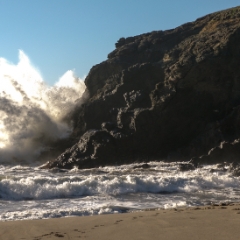 Waves crashing on rocks